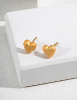 Pure silver heart-shaped stud earrings