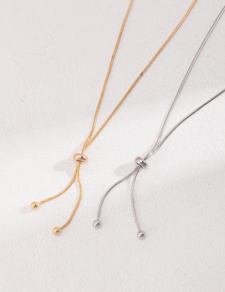 A long sterling silver necklace