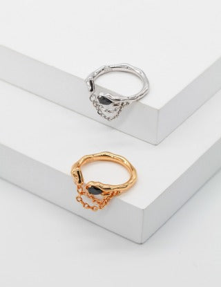 A pure silver synthetic spinel ring