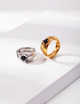 A pure silver synthetic spinel ring