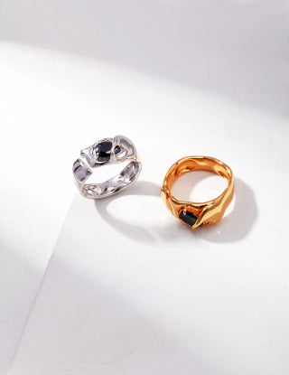 A pure silver synthetic spinel ring