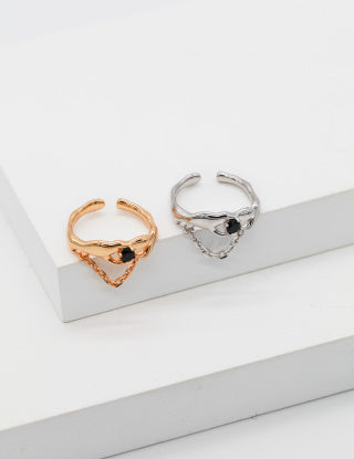 A pure silver synthetic spinel ring